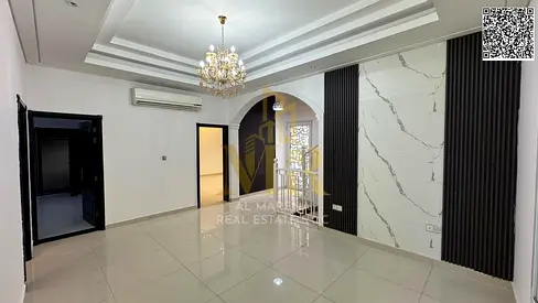 Two-story villa in Al Yasmin, 5 bedrooms, at a special price including electricity, water, and air conditioning fees, in one of the most prestigious a
