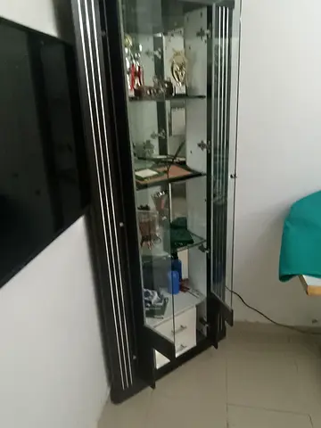 Large Black Display Cabinet with Glass Shelves and Mirrored Back