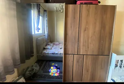 Wood Finish 4-Door Wardrobe / Armoire — Good Condition