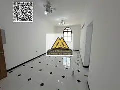 A luxury 2-bedroom apartment with a living room for annual rent in Al Rawda 3 – Ajman, featuring s