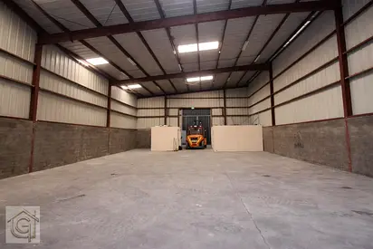 Warehouse with Office Space & Washroom | Prime Location – Umm Ramool.