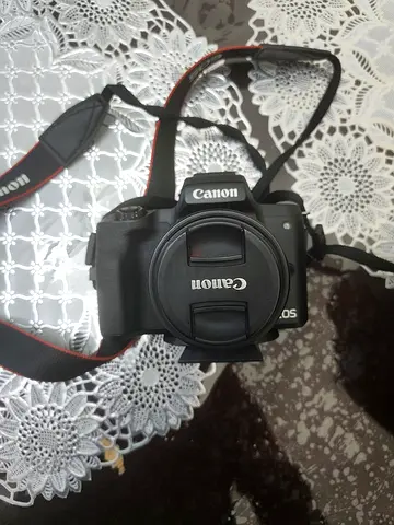 Canon mirrorless M50 camera with Strap and Body Cap - Good Working Condition