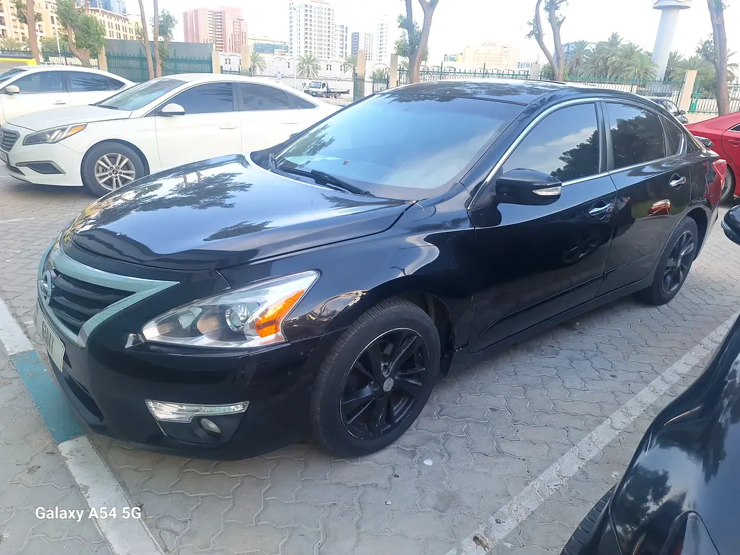 Nissan Altima 2013 — photo 1 of 9