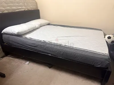 Queen leather bed frame with mattress included - good condition