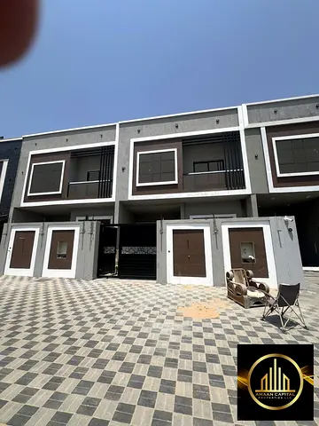 Townhouse for sale in Al Zahiyah area, near Sharjah exit and Emirates Road, for 50,000 dirhams less