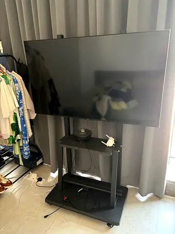 Flat screen TV (50) on stand - good working condition