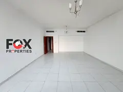 Two rooms and a living room for annual rent in Falcon Towers in Al Rashidiya 2 area, free parking, b
