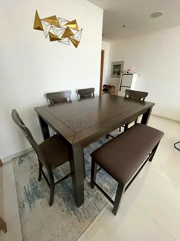 Solid Wood 6-Seater Dining Table with Bench and 4 Chairs - Dark Finish. price is negotiable
