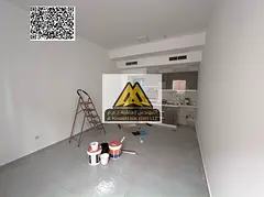 A spacious studio for annual rent in Al Rawda 1 – Ajman, second tenant, featuring central air cond