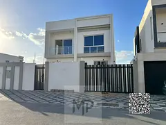 Luxury villa for sale in Al Zahia, Ajman, with a modern design and ultra-luxurious finishing in a pr