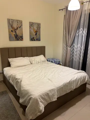 Queen upholstered bed frame with headboard - good condition