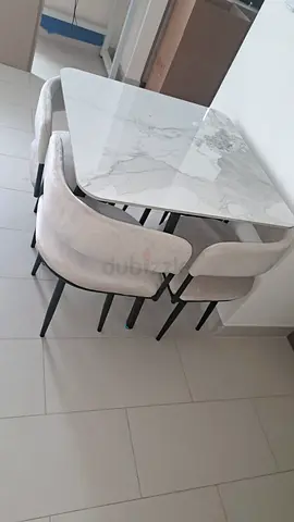 marble-top dining table with 4 upholstered chairs Excellent Condition