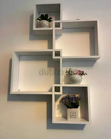 White Geometric Wall Shelves Modern Floating Cubes لدي مجموعتين من هذه الارفف