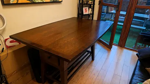 Solid Dark Wood Dining Table with Storage Shelf