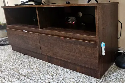 Low wooden TV unit with two drawers and open shelves - dark brown