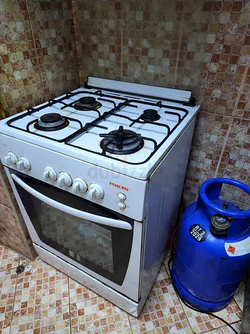 Used freestanding 4-burner gas stove with oven (works well) only stove
