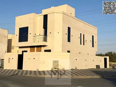 A bargain price for a 4-bedroom villa for sale in Ajman, Al Helio area, including registration fees.
