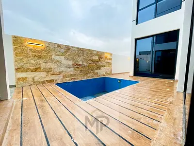 Villa for sale, including registration and ownership fees, at an attractive price, right next to services and the mall. Freehold ownership for all nat