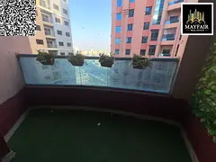 Apartment for rent in Al Nuaimiya Towers: 1 bedroom, living room, balcony with open view, prime loca