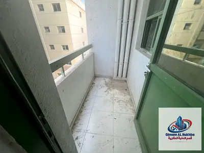 The most beautiful two-bedroom apartment with a living room in Al Qasimia (Al Mahatta), featuring a balcony with a very nice view, located next to Al