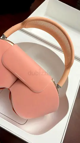 Lightly used pink over-ear wireless headphones (like AirPods Max style)