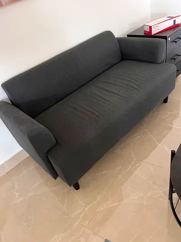 Dark grey 2-seater sofa in good condition