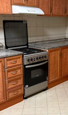 4-Burner Gas Stove with Oven - Good Working Condition