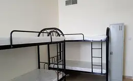 Bed space in dubai land complex near to marksave only Girls