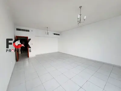 Two bedrooms and a living room for annual rent in Ajman, City Towers, Al Nuaimiya 3, next to Al Safeer Mall. Free parking, two bathrooms, closed kitch