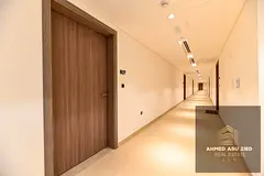 English: Location: Aljada 2 – Sharjah A stylish 3-bedroom apartment with a living room featuring a
