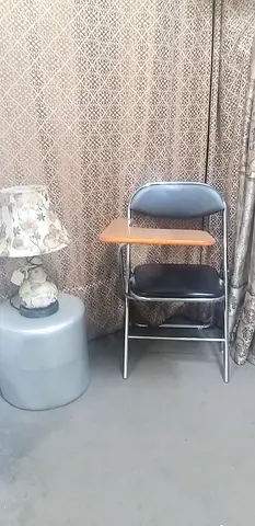 Compact metal folding study chair with attached wooden writing pad - used