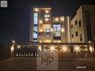 Villa for sale at ajman|al helio2 area|5 master rooms, majlis, 3 halls, roof, maid room|freehold|the price includes registration fees and central A\C.