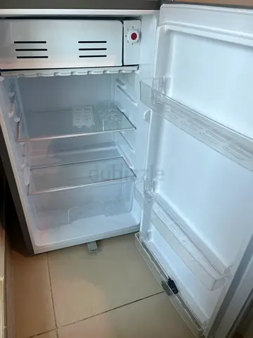 Compact single-door refrigerator with small freezer - good condition