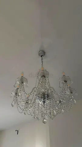 2Crystal chandelier with hanging beads Hedes brandI bought it in 90% promotion 6000 AED