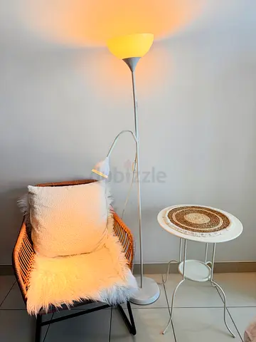 IKEA TÄGARP floor uplighter with an integrated reading lamp.