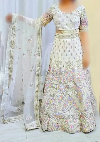 Beautiful white multicolor dress from dimple in 100 aed only