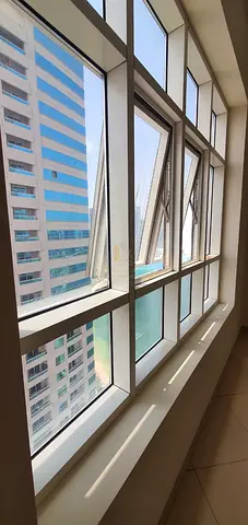 🏡 For Sale: 1-Bedroom Apartment with Stunning Side Lake View in Al Khan Area 🏡