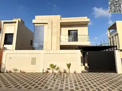 A luxurious villa with a modern design and super deluxe finishing, located in the Al Zahia area in a