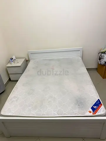White wooden double bed with mattress - good solid frame