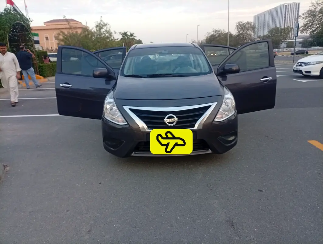Nissan Sunny 2016 — photo 1 of 13