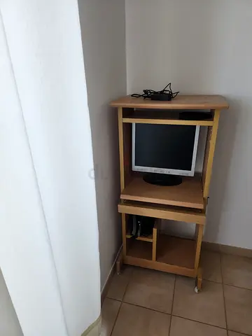 Compact wooden computer desk on wheels - light oak finish