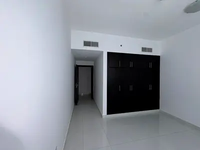 For annual rent in Mushrif, Ajman, Al Ittihad Street: One bedroom and living room, separate lounge, two bathrooms. Prime location close to all service