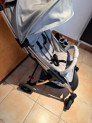 Light grey standard baby stroller in good condition