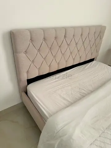 Light beige tufted bed frame with upholstered headboard (good condition)