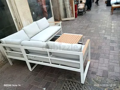 White Outdoor Sofa Set with Cushions and Coffee Table
