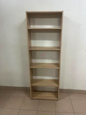 Open-design wooden bookcase with multiple shelves from Atikia