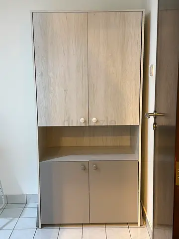 Compact wooden storage cabinet with cupboard and shelves - light oak finish