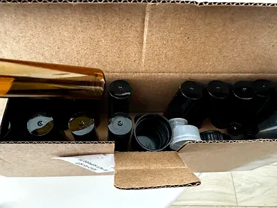 Collection of Empty Small Bottles (10ml Amber rose roll on bottles)