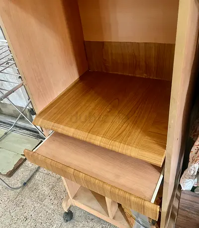 My compact wooden computer desk on wheels