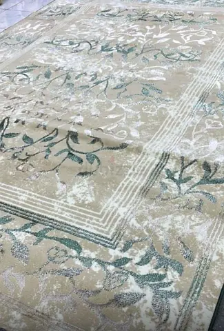 Large beige floral area rug — excellent condition